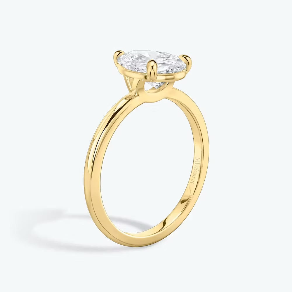 Pear Solitaire Ring