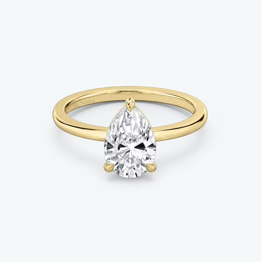 Pear Solitaire Ring
