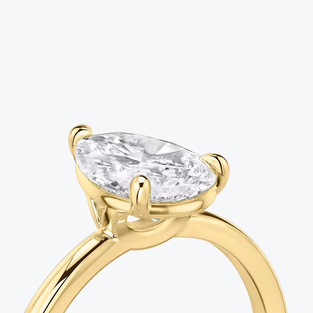 Pear Solitaire Ring
